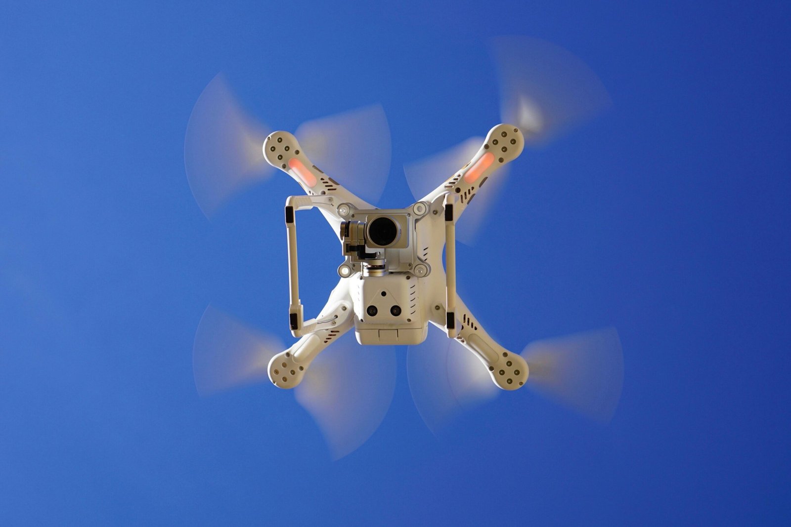 A drone flying over a rice field in Assam, India