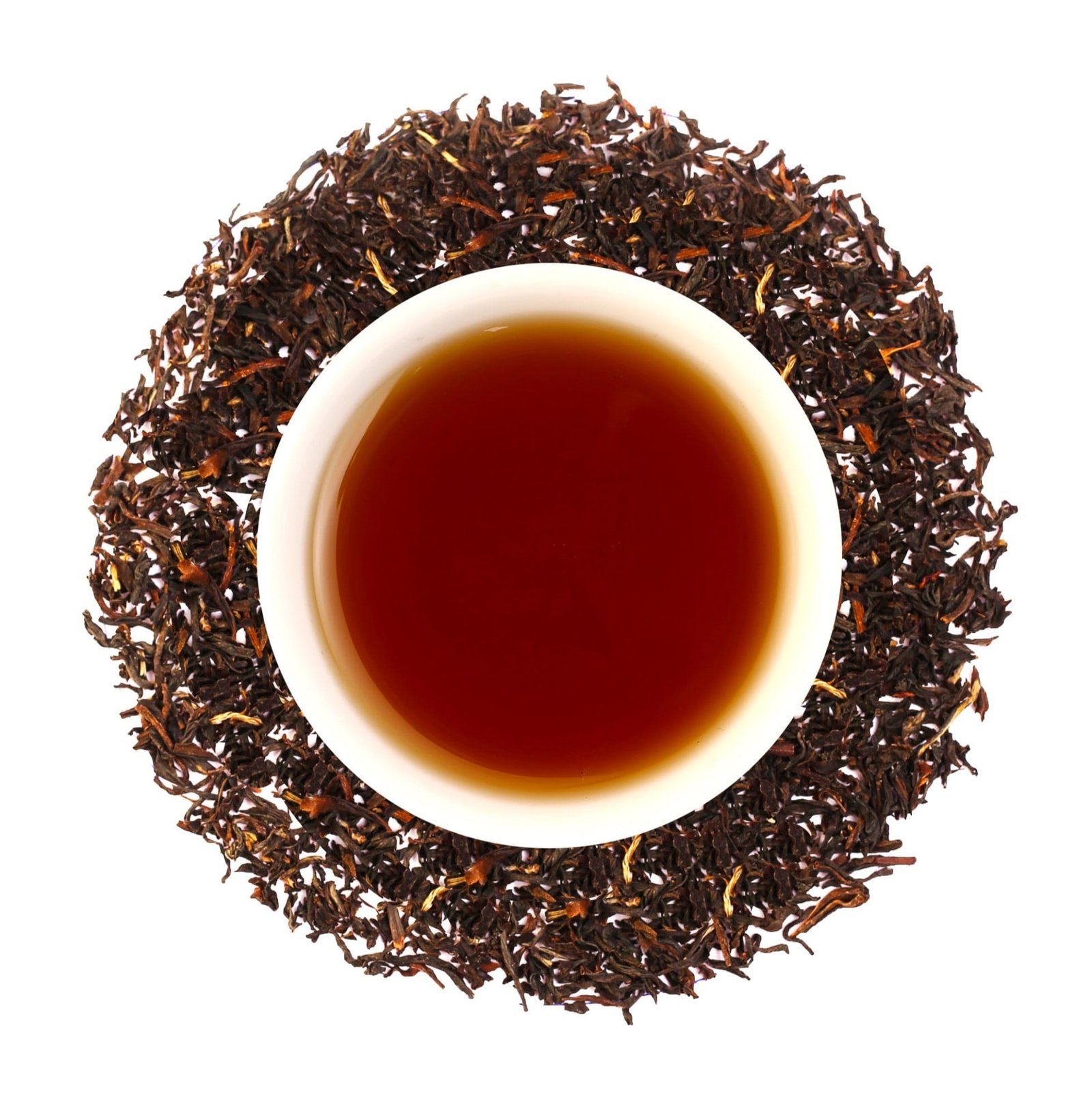 Assam Orthodox Tea leaves, harvested from organic tea gardens in Assam, known for their bold flavor.