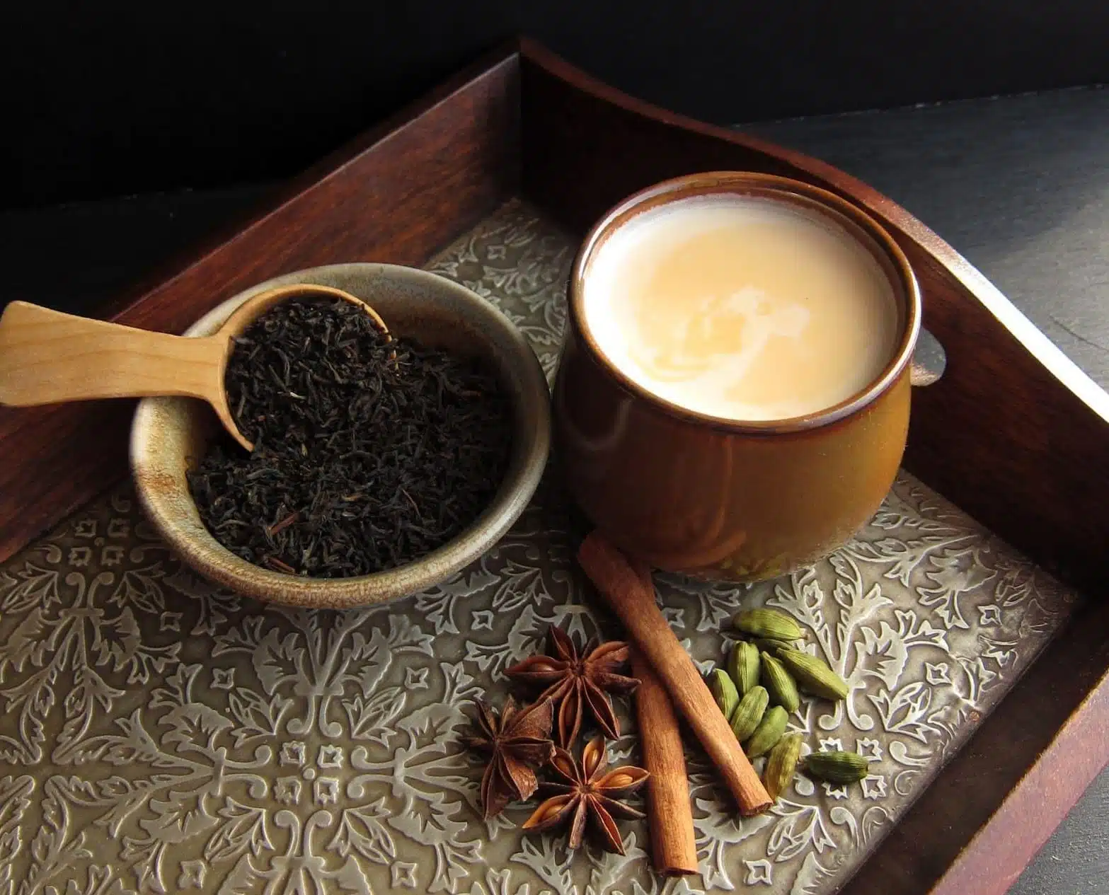 Traditional masala chai made from Assam black tea in a clay cup.