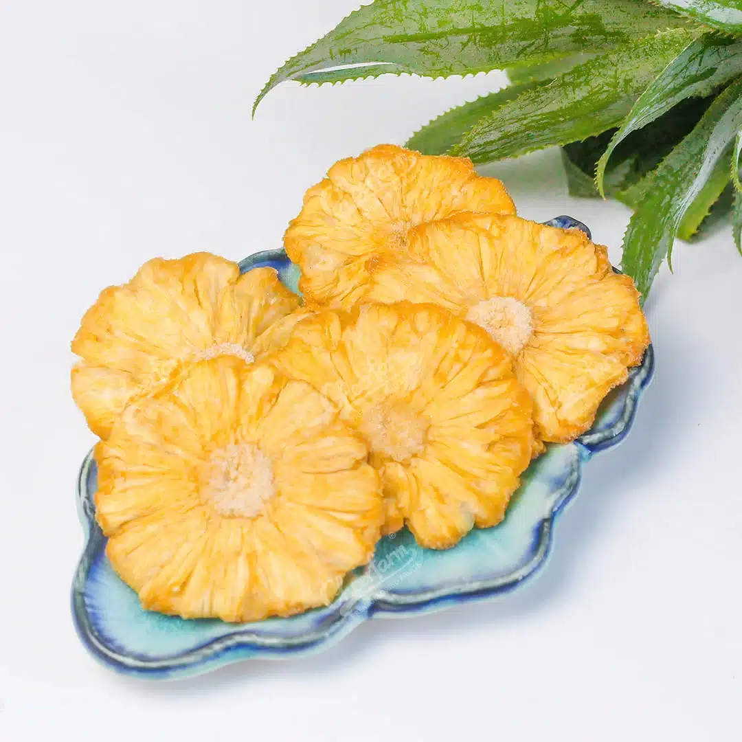 Dried Queen Pineapple slices, a popular value-added product.