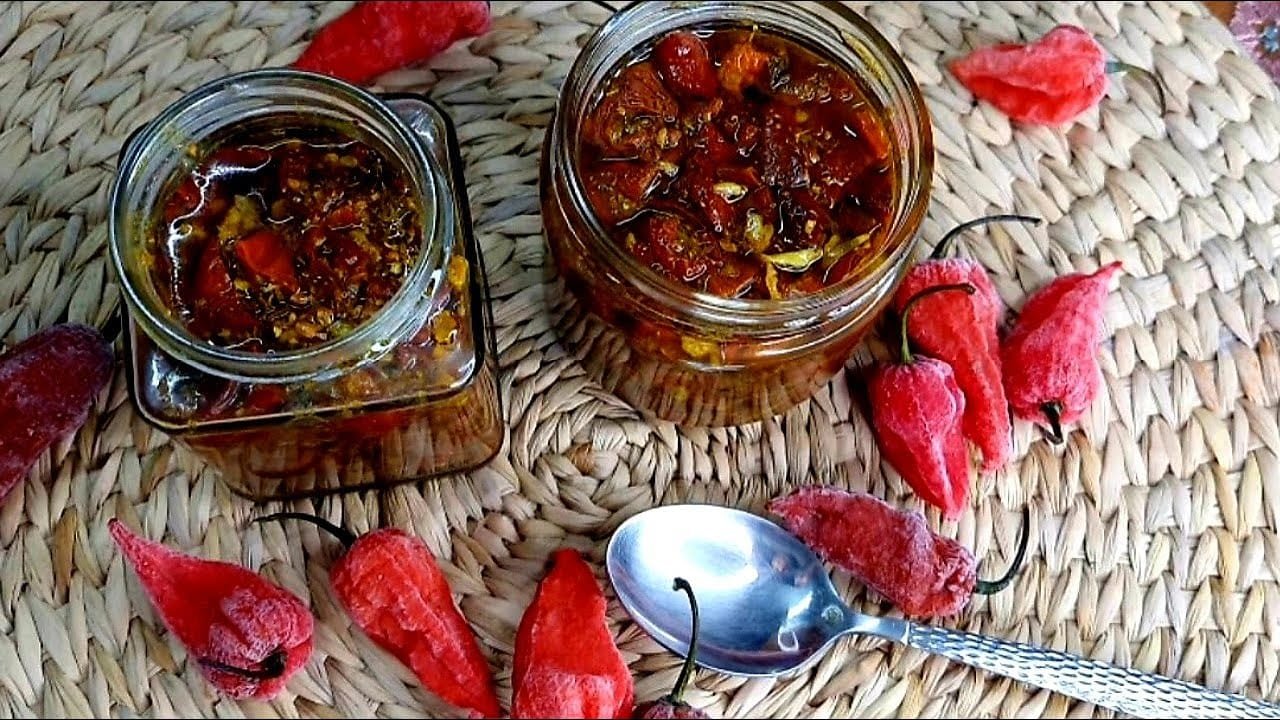 A jar of traditional Bhut Jolokia chutney, a fiery delicacy in Northeast Indian cuisine.